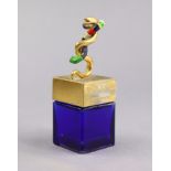 A Niki De Saint Phalle First Edition blue glass perfume bottle with entwined snake finial, 9.5cm