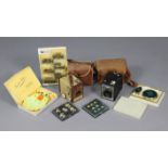 A Stratton gilt-metal & green enamelled compact & lipstick holder, boxed; two Kodak “Brownie” box