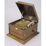 A vintage Columbia “Grafonola table-top gramophone in an oak case, 43cm wide.