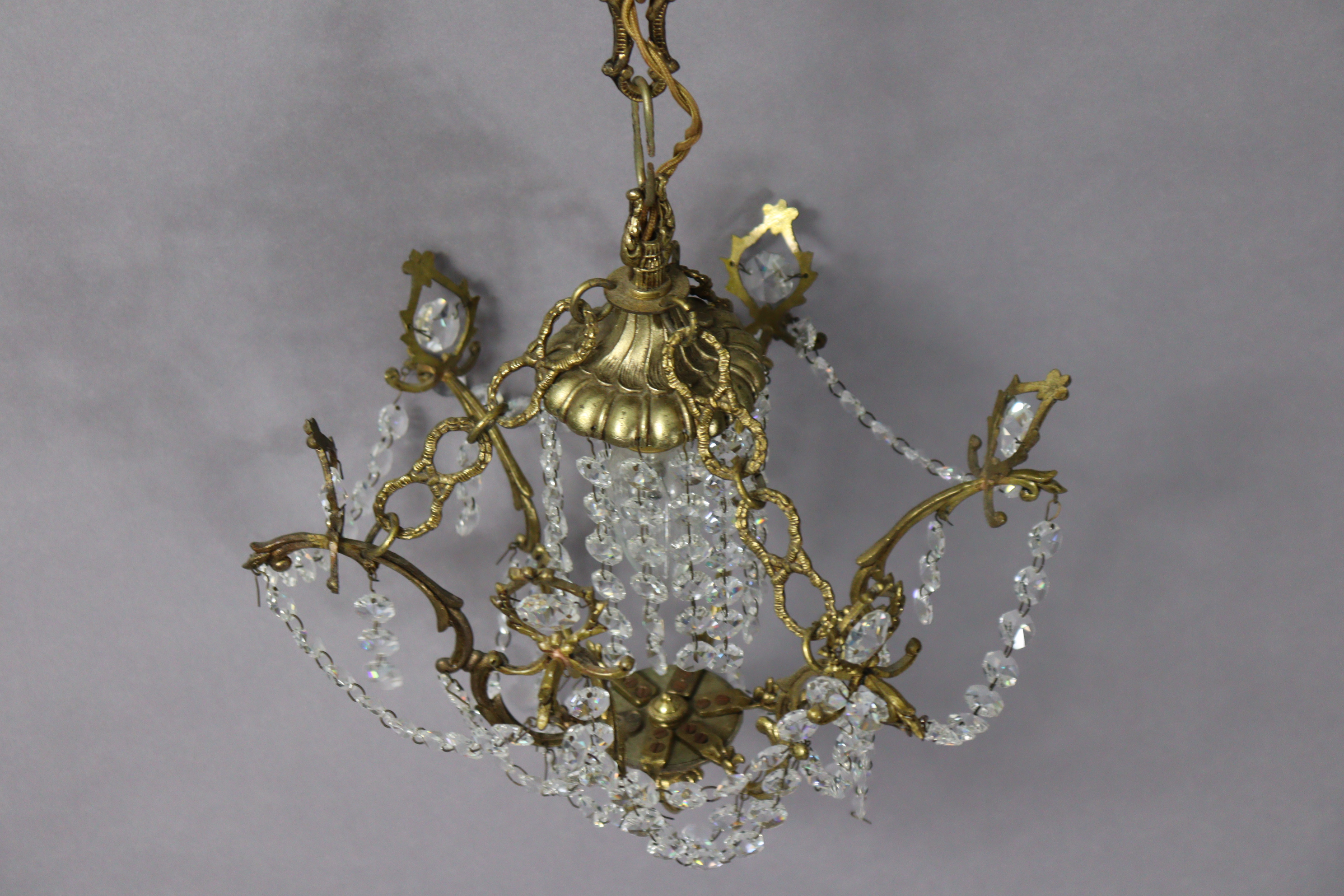 A bronzed metal five-Branch ceiling light fitting hung with cut-glass prism drops & strands-of- - Image 2 of 2