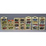 Sixty-two Lledo “Days Gone” die-cast scale model delivery vans, each with window box.