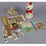 A mid-20th century “Snowman” pinata; two cribbage boards; a dog soft toy, etc.