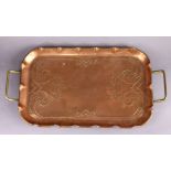An Arts & Crafts copper rectangular two-handled tray by John Sankey & Sons, with stylised embossed