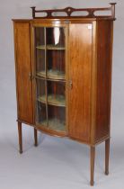 An Edwardian Art Nouveau inlaid-mahogany tall break-front china display cabinet, fitted three centre