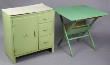 A vintage green painted wooden dwarf kitchen cabinet with a laminate top, fitted three long