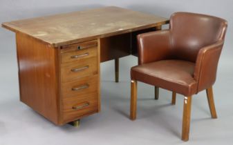 A mid-20th century teak office knee-hole desk, fitted with a brushing slide above three long