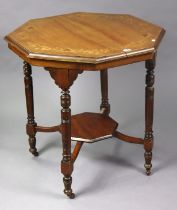 A 19th century inlaid-mahogany octagonal centre table (split to top), on four turned & tapered