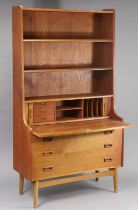 A mid-20th century Danish Borge Mogensen teak bookcase, with pull-out secretaire desk & fitted