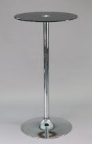 A silvered-metal tall bar table with a circular smoked-glass top, 58cm diameter x 109.5cm high.