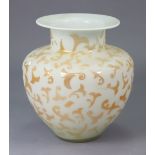 A large art-glass globular vase of white ground & with all-over repeating gold geometric design,