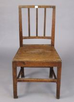 An early 20th century cottage dining chair with a hard seat, & on square tapered legs with plain