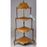 A 19th century inlaid-mahogany four-tier corner whatnot with spiral-twist supports & on turned feet,