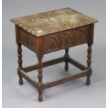 A 19th century carved oak bible-box with a hinged lift-lid, & on turned supports & feet with plain