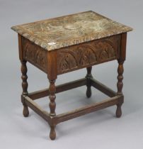 A 19th century carved oak bible-box with a hinged lift-lid, & on turned supports & feet with plain