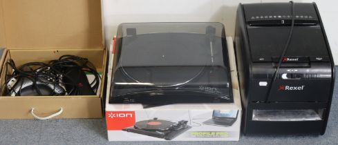 An Ion “Profiele Pro” turntable; a Polycom conference phone; both boxed, & a Rexel Shredder.