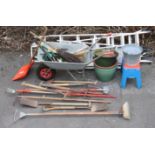 An aluminium wheelbarrow; two aluminium, ladders; various garden & hand tools, etc.