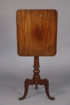 A 19th century mahogany tripod table with rectangular tilt-top, 16¾” wide x 28¾” high; together with