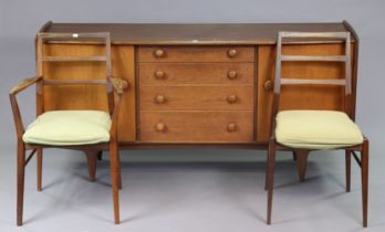 A mid-20th century Younger’s Ltd teak dining room suite comprising of a rectangular table on four