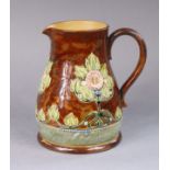 A Royal Doulton large jug with raised stylised floral decoration on a brown-glazed ground, 18cm