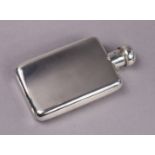 A late Victorian silver pocket spirit flask of curved rectangular shape with hinged ball cap, cm