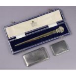A silver-gilt letter opener with shell terminal, 19cm long, London 1979, by Royal Irish Silver