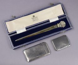 A silver-gilt letter opener with shell terminal, 19cm long, London 1979, by Royal Irish Silver