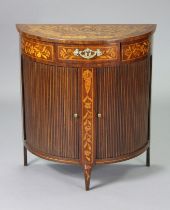 A late 18th century Dutch inlaid mahogany demi-lune side cabinet with all-over marquetry floral