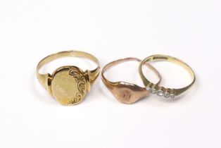An 18ct. gold ring set row of five tiny diamonds, size: O, 1.6gm; & two 9ct. gold signet rings, 5.