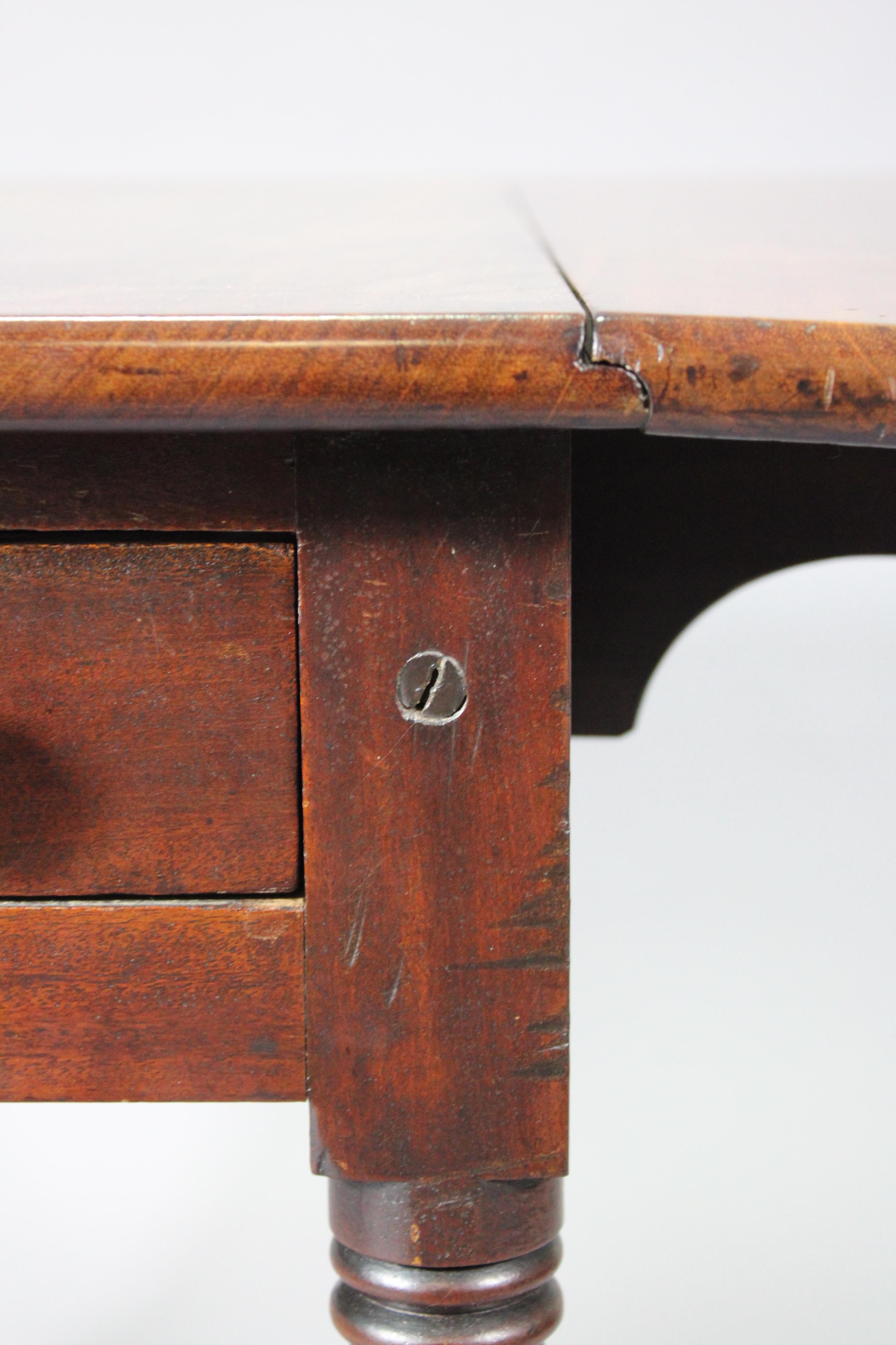 A Victorian mahogany Pembroke table, fitted with a drawer to one end, on turned tapering legs with - Image 3 of 4