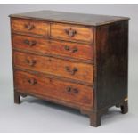 A George III mahogany chest fitted two short & three long drawers with brass swan-neck handles & b