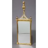 A Regency-style small pier glass in giltwood & gesso frame with inset verre eglomise panel to the