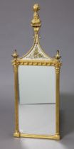 A Regency-style small pier glass in giltwood & gesso frame with inset verre eglomise panel to the