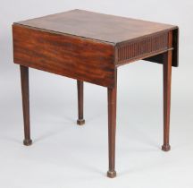 A George III drop-leaf side table with fluted frieze, fitted end drawer, & on tapering reeded square