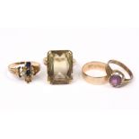 A 9ct. gold ring set large rectangular-cut citrine, size Q/R, weight: 8gm; another set oval amethyst