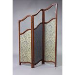 A late Victorian mahogany three-fold draft screen inset bevelled glass above silk damask panels,