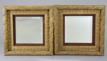 A pair of 19th century giltwood & gesso rectangular wall mirrors, inset bevelled plates in rope-