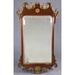 A George II style fret-carved mahogany & parcel gilt rectangular wall mirror, inset bevelled
