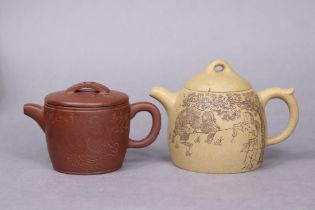 A 20th century Chinese Yixing zisha teapot & cover with short spout & loop handle, incised