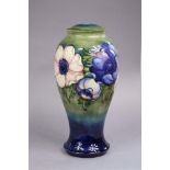 A Moorcroft pottery “Anemone” pattern large lamp base of baluster shape, sea-green & blue ground,