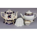 A late 18th/early 19th century English porcelain teapot & stand with blue and gilt floral bands,