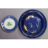 A 19th century Crescent China blue-ground shallow basin with overturned rim & gilt landscape