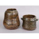 Two Japanese studio pottery seto-style tenmoku glazed jars of double-gourd shape, with painted