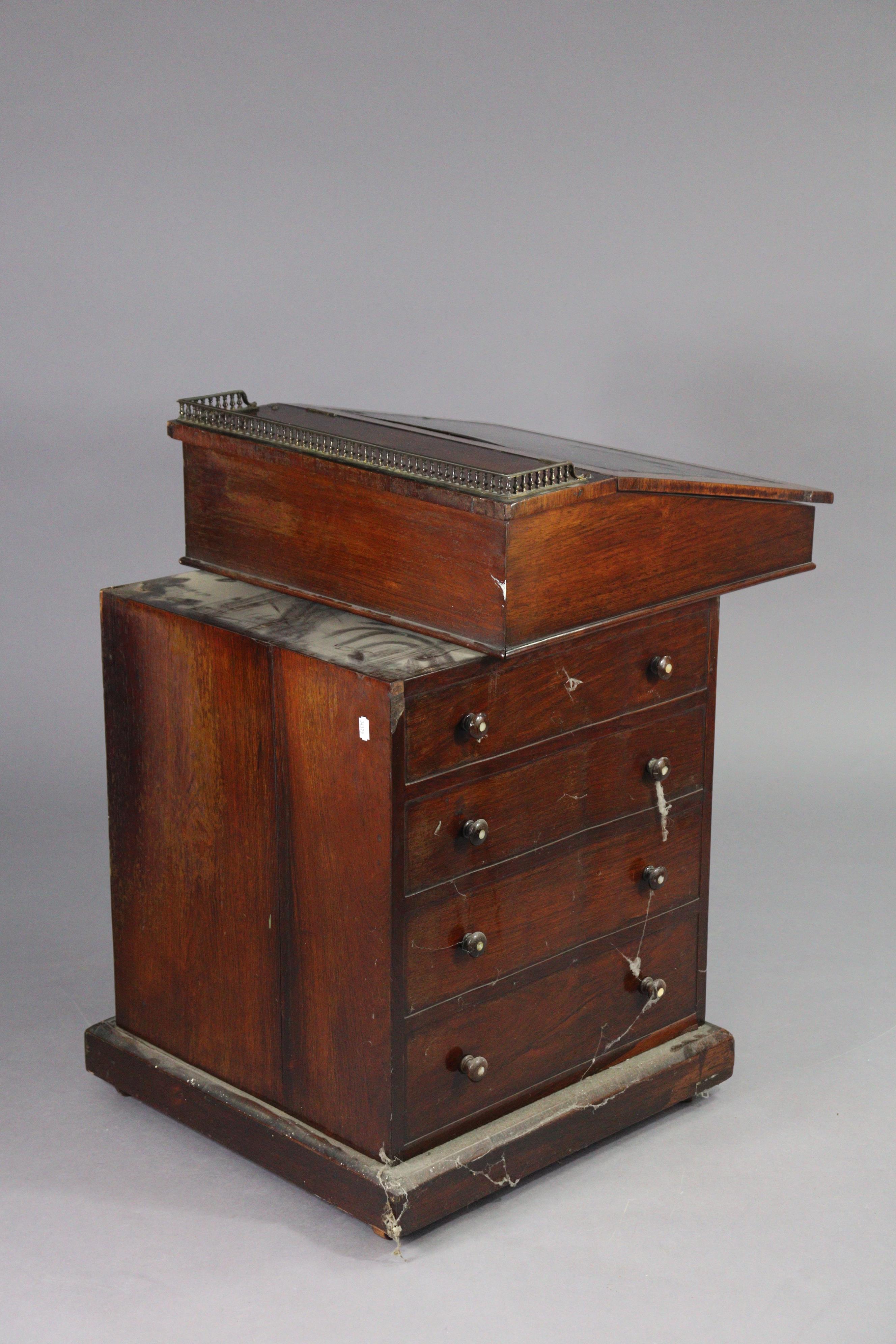 An early 19th century rosewood davenport, the forward-sliding top with brass gallery & long hinged - Image 9 of 9