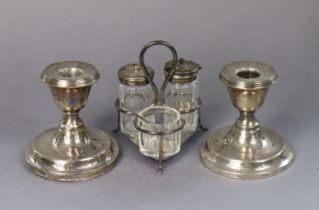 An Edwardian silver small cruet frame fitted three cut glass condiments, Birmingham 1904; & a pair