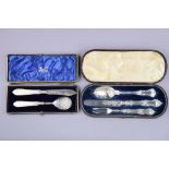 A late Victorian silver preserve spoon with embossed oval bowl, & a butter knife with engraved