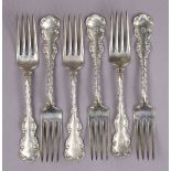 A set of six sterling dessert forks with fancy scroll stems. (9½ oz.).