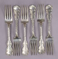 A set of six sterling dessert forks with fancy scroll stems. (9½ oz.).
