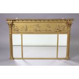 A regency gilt frame triple-panel over mantle mirror with classical figure scene decoration, inset