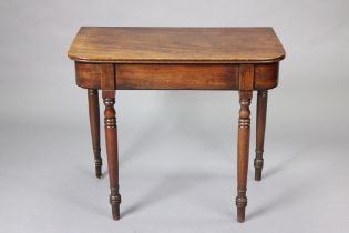 A regency mahogany side table with rounded corner to the plain rectangular top, on turned tapering