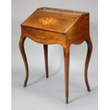 A 19th century French ladies bureau with marquetry decoration to the hinged fall-front enclosing a